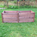 Long wooden compost bin with extension module